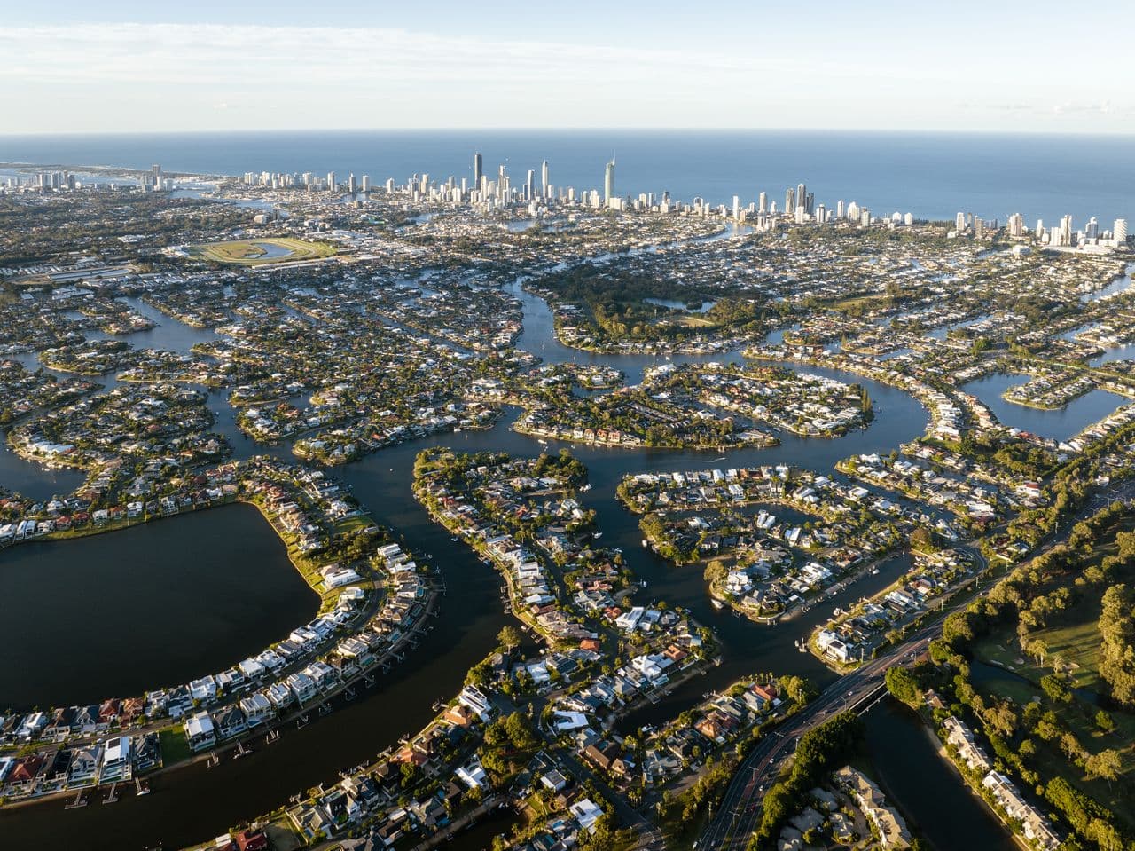 Aerial view of Gold Coast canal estates and Surfers Paradise skyline